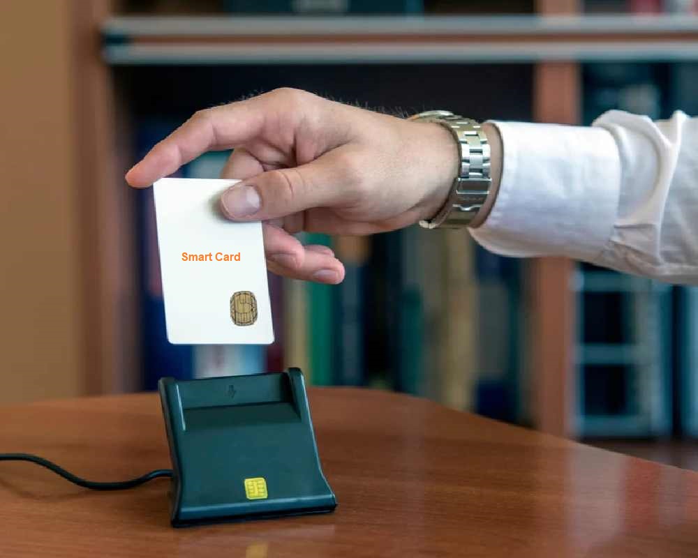 A man is checking smart card on Smart Card Reader.