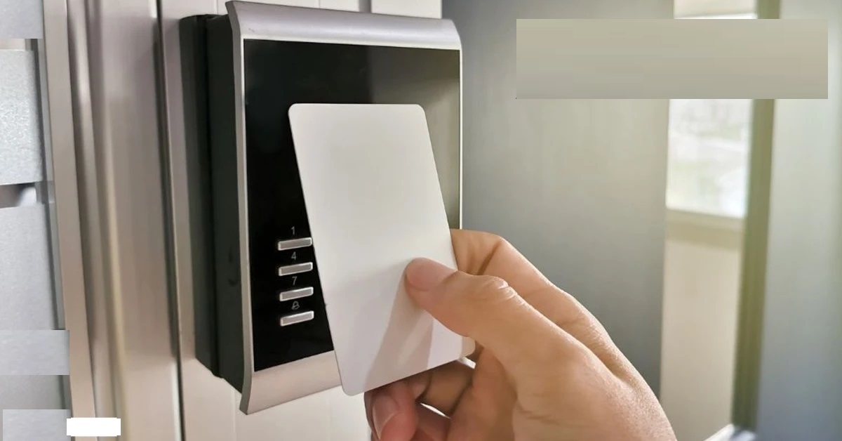 An man with RFID Smart Card Reader to get access door to open